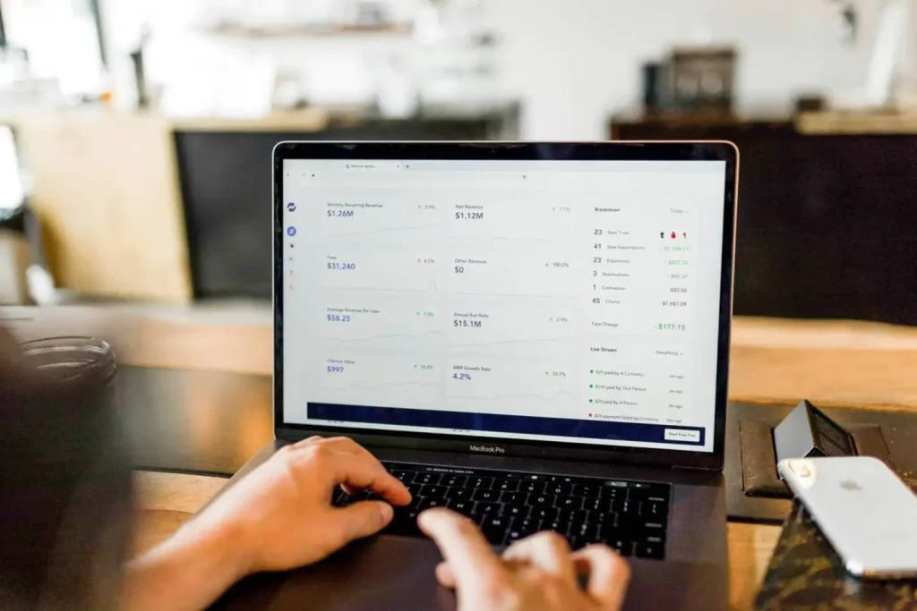 Image of a person checking income through his recurring business
